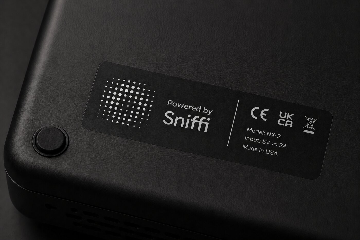 Powered by Sniffi mark on a product label, alongside CE, UKCA, and Made in USA regulatory marks